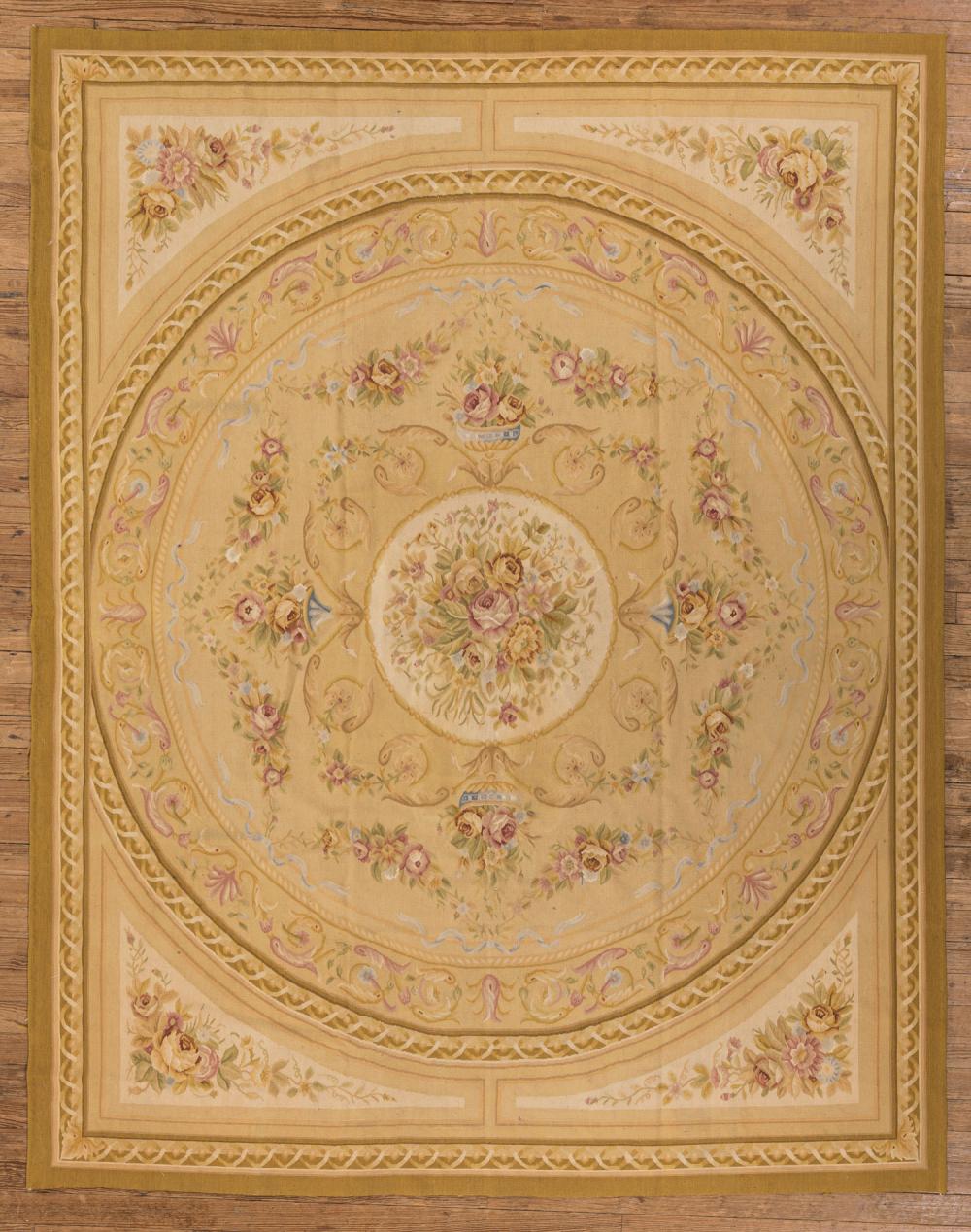 Appraisal: Aubusson-Style Carpet mustard ground olive border floral designs ft in