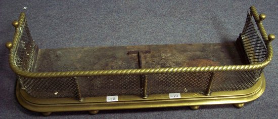 Appraisal: A late Regency brass D shaped fender with rope top