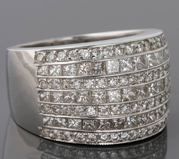 Appraisal: A diamond and k white gold band estimated total diamond