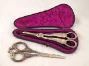 Appraisal: A pair of late Victorian silver grape scissors in fitted