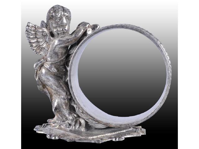 Appraisal: Angel Stands by Figural Napkin Ring Description Angel stands by