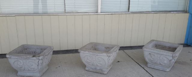 Appraisal: Trio of Concrete Outdoor Planters All three planters in one