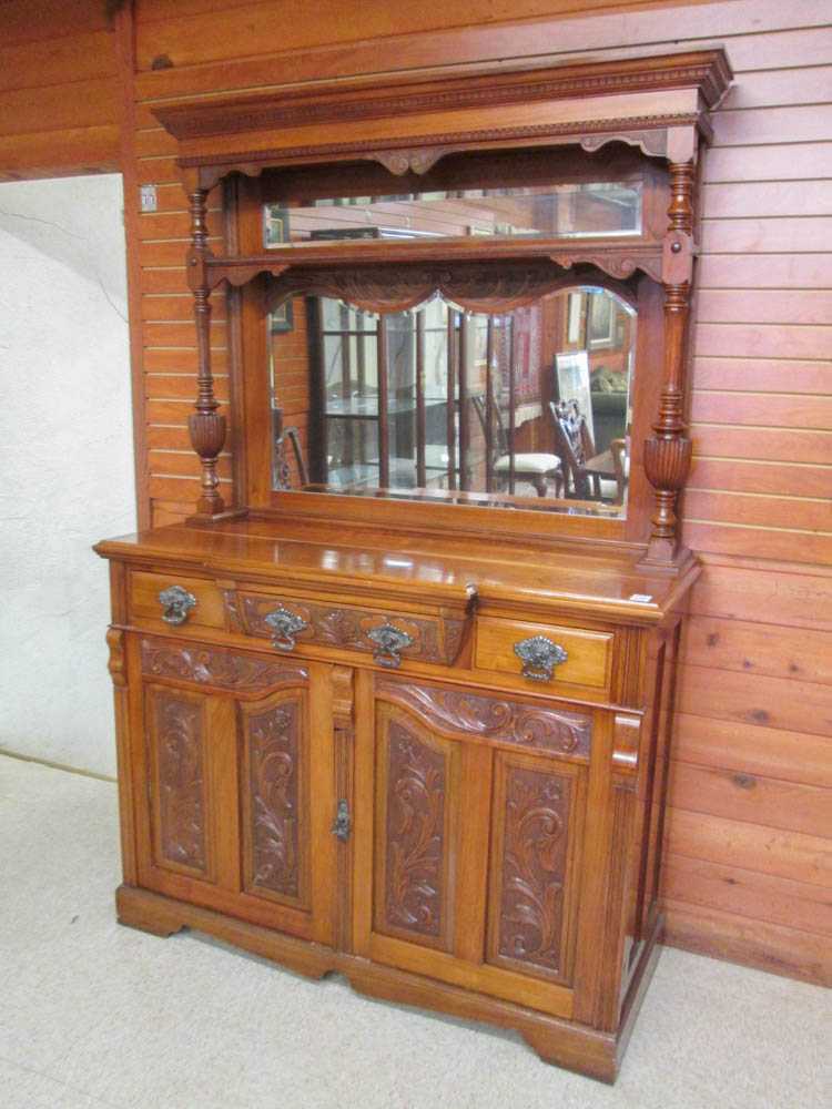 Appraisal: A VICTORIAN CARVED AND FRENCH POLISHED WALNUT PETITE SIDEBOARD English