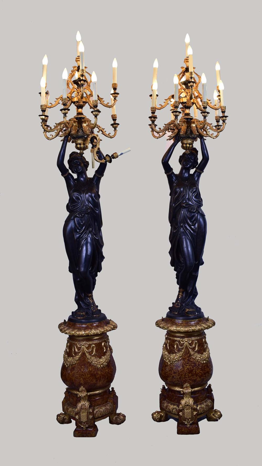 Appraisal: PAIR OF LARGE BRONZE MAIDENS WITH CANDELABRASPAIR OF LARGE BRONZE