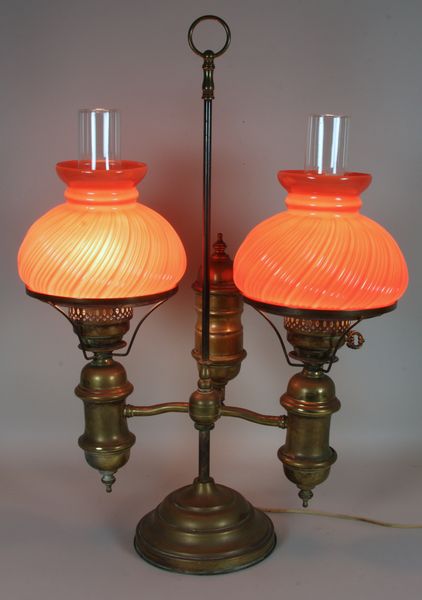 Appraisal: Early th Century brass student lamp with shades h x