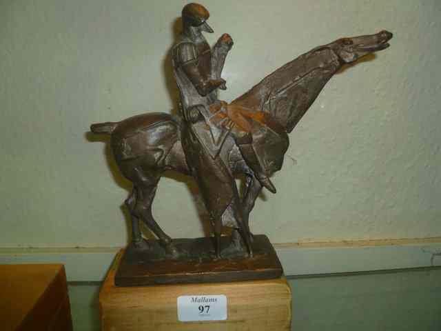 Appraisal: TH CENTURY BRONZE SCULPTUREof a knight in armour on horseback