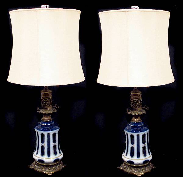 Appraisal: A pair of gilt metal mounted porcelain table lamps together