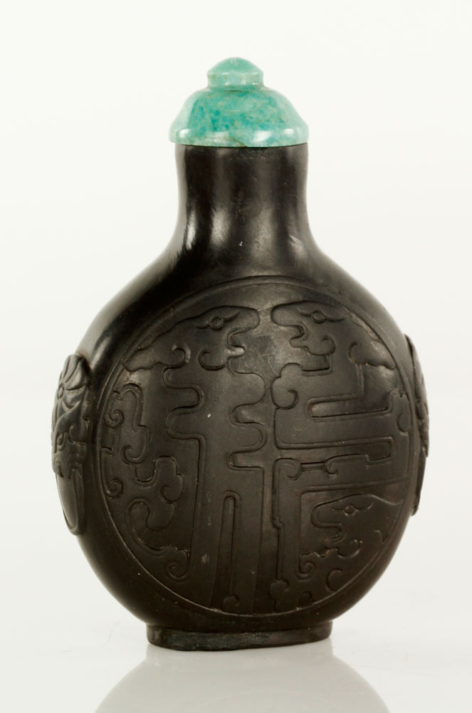 Appraisal: - Chinese Carved Snuff Bottle Carved snuff bottle with turquoise