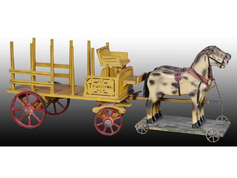 Appraisal: Wood Trucking Hay Wagon Toy Description '' Includes two horses