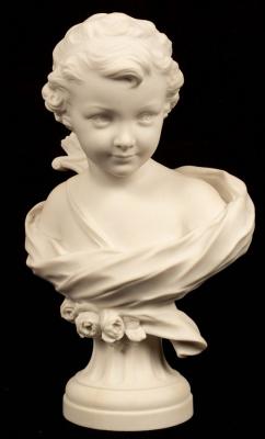 Appraisal: A biscuit porcelain bust of Cupid th Century impressed S