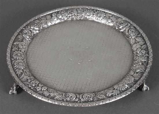 Appraisal: American repousse and engraved sterling silver footed card tray Jacobi