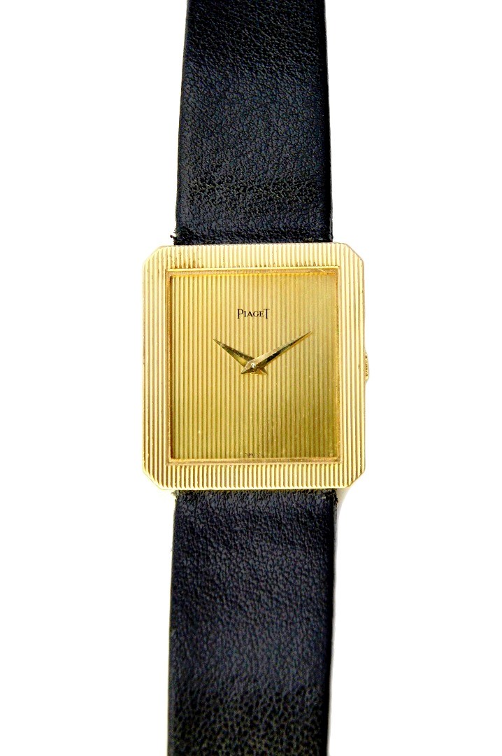 Appraisal: A gold rectangular cased Piaget wristwatch the signed square gilt