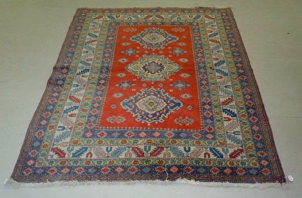 Appraisal: Oriental center hall carpet with geometric patterns ' x '