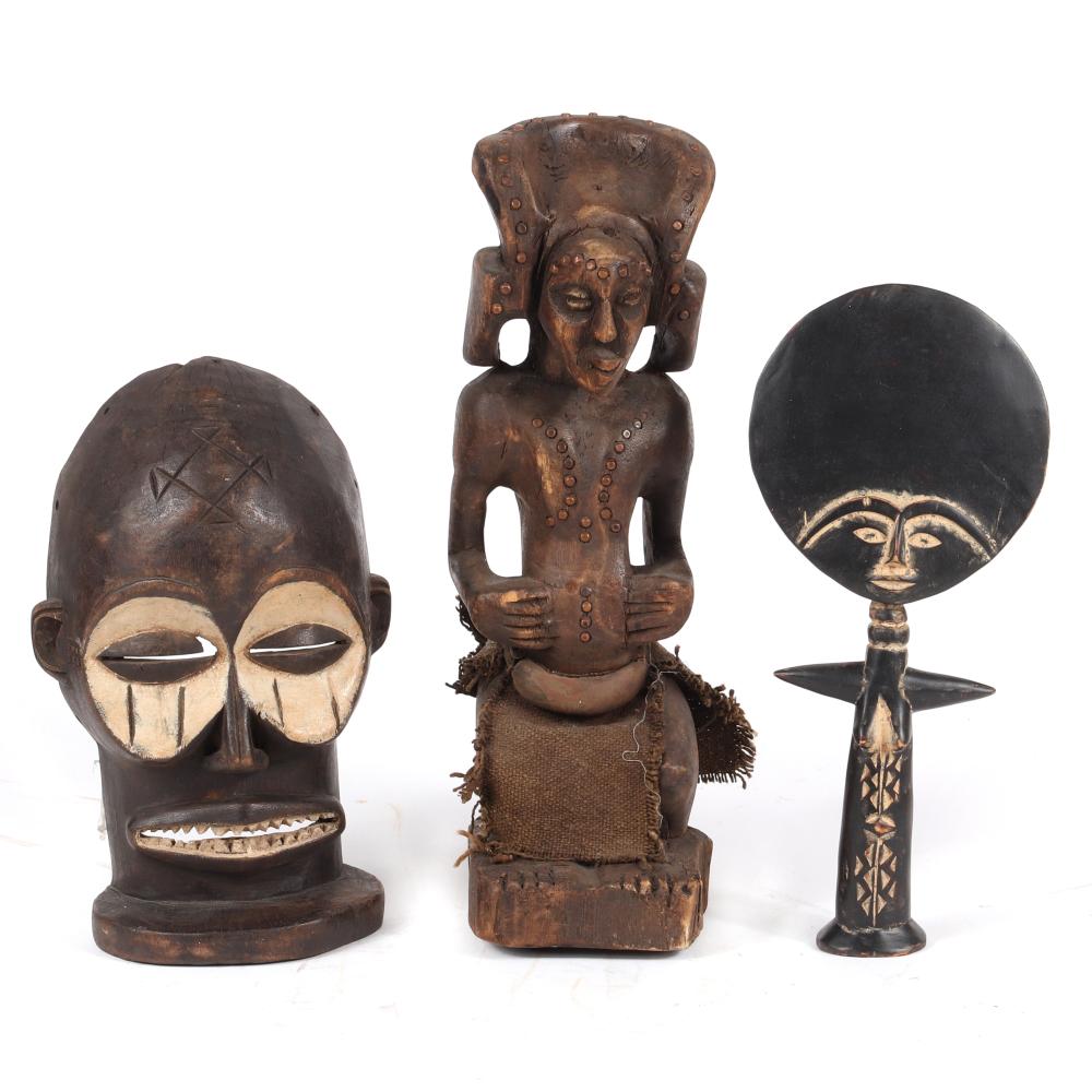 Appraisal: THREE AFRICAN TRIBAL CARVED WOOD STATUES AND A PAINTED MASK