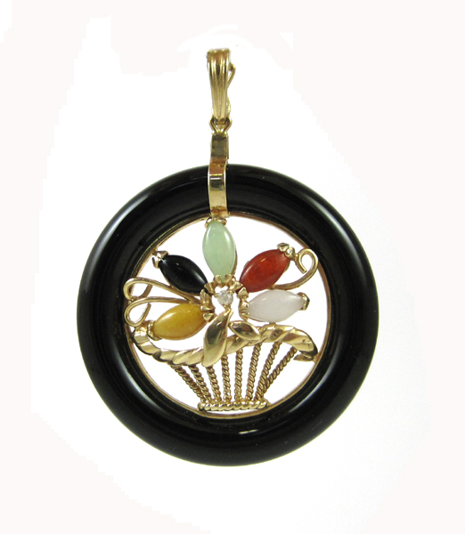 Appraisal: BLACK ONYX AND MULTI-COLOR JADE PENDANT The k yellow gold