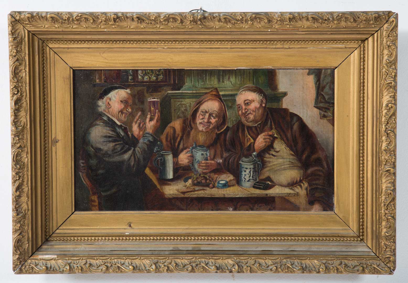 Appraisal: Framed oil on canvas of three men in tavers Undernumber