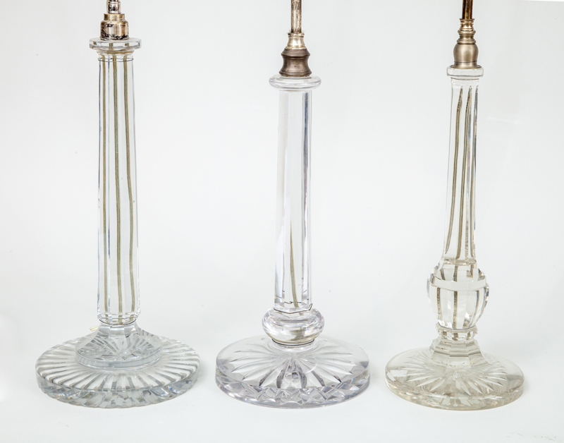 Appraisal: THREE SIMILAR VICTORIAN GLASS COLUMN-FORM TABLE LAMPS Two with octagonal