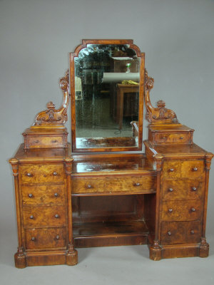 Appraisal: A Victorian walnut and burr walnut duchess dressing table the