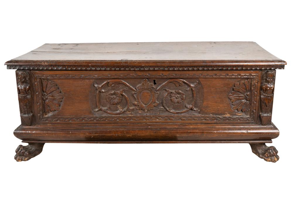 Appraisal: ANTIQUE CARVED WALNUT CASSONEwith hinged lid opening to an unlined