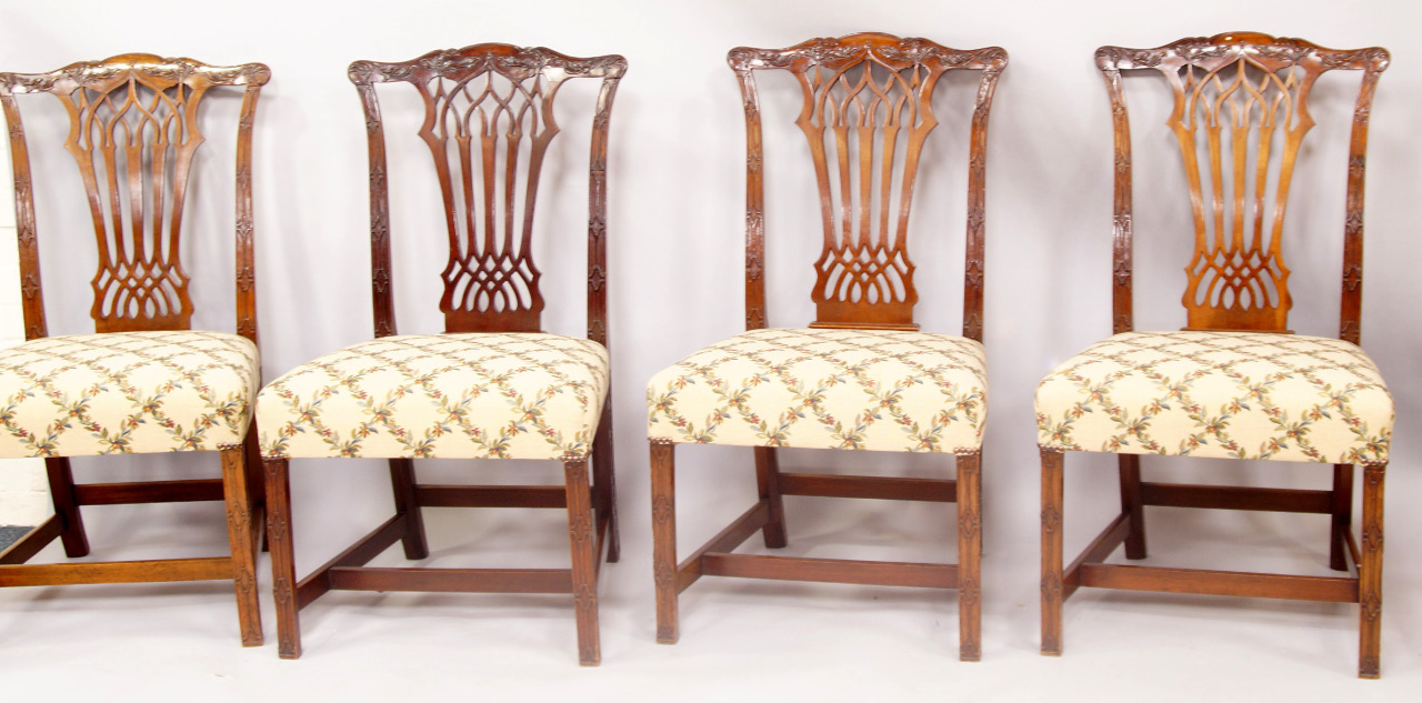 Appraisal: A set of four Chippendale design dining chairs each with