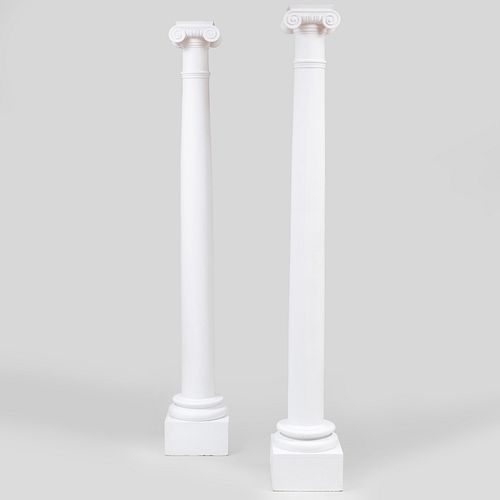 Appraisal: PAIR OF WHITE PAINTED CARVED WOODEN IONIC COLUMNS ft in