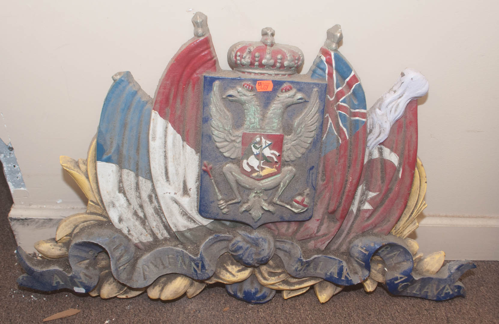 Appraisal: Cast iron coat of arms Undernumber