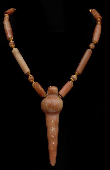 Appraisal: BEADED NECKLACE WITH SHELL-FORM PENDANT in Provenance Property from the