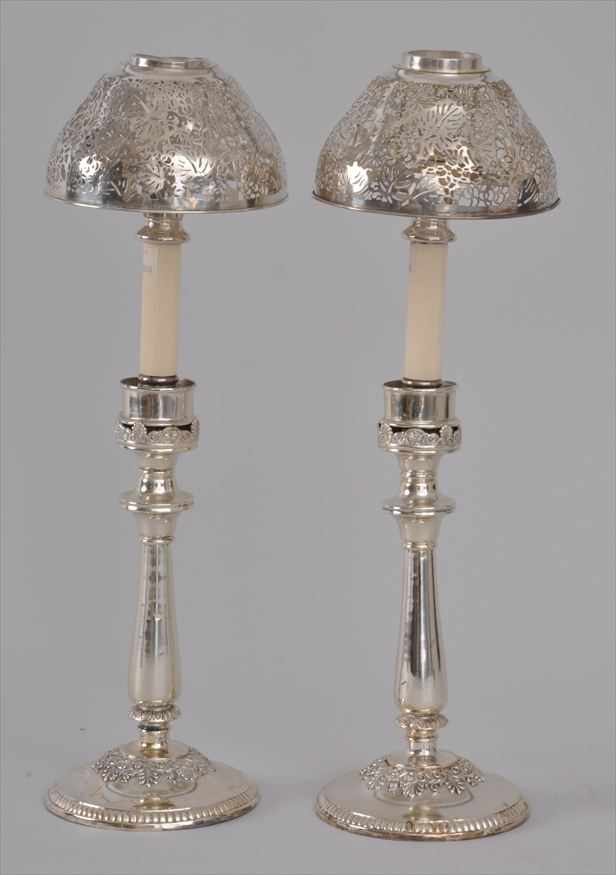 Appraisal: PAIR OF SILVERPLATE CANDLESTICKS WITH A PAIR OF TIFFANY STUDIOS