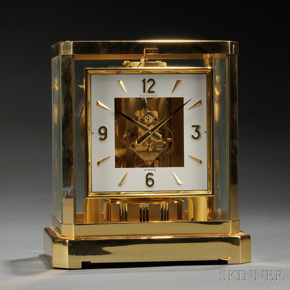 Appraisal: Atmos Brass and Glass Clock by Le Coultre Switzerland brass