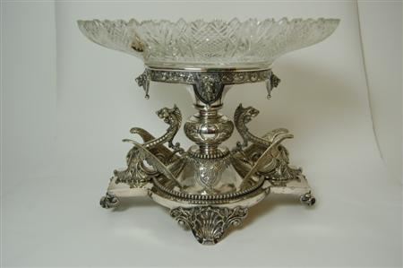 Appraisal: A large silver plated centre piece the shaped base raised