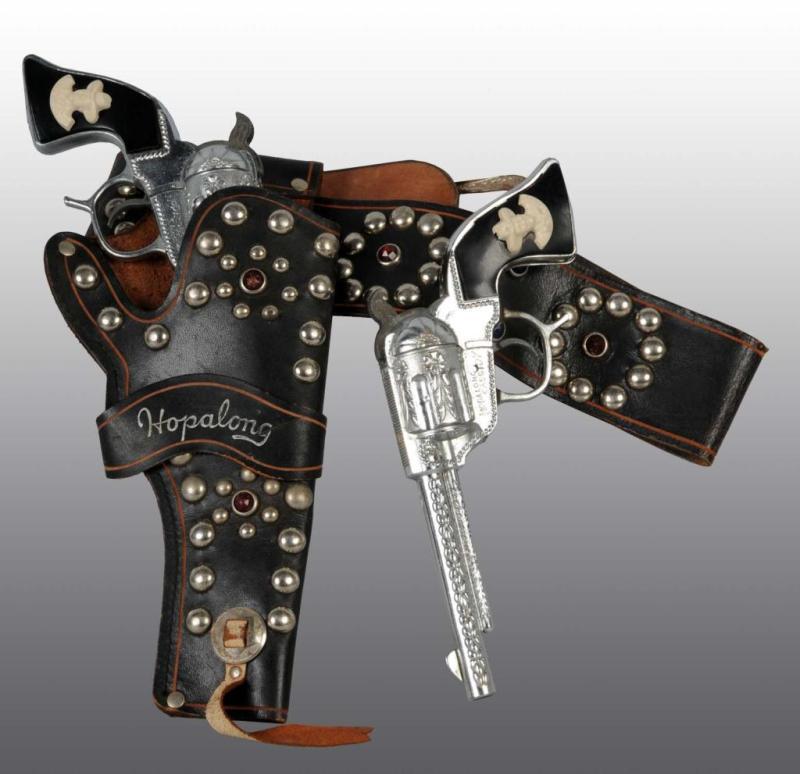 Appraisal: Hopalong Cassidy Toy Gun Holster Set Description Set includes two