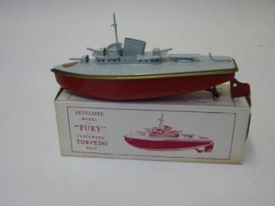 Appraisal: A Fury torpedo boat clockwork grey deck red hull with