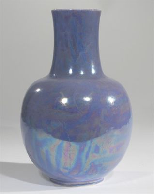 Appraisal: A Ruskin Pottery vase dated ovoid body with waisted cylindrical