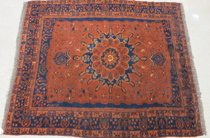 Appraisal: AFGHAN CARGHI TRIBAL AREA RUG floral and central floral lozenge