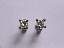 Appraisal: A pair of ct white gold princess cut diamond stud