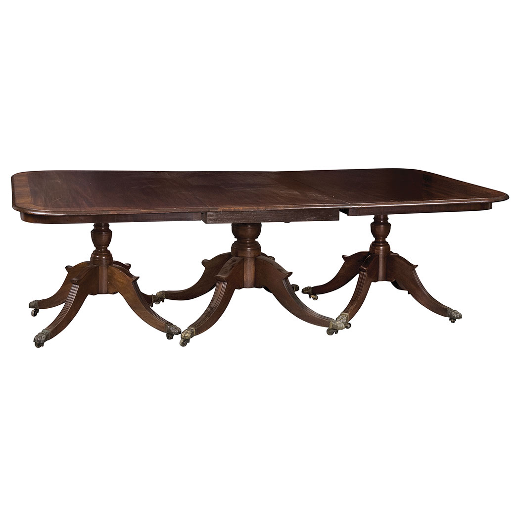 Appraisal: George III Mahogany Triple Pedestal Dining Table The banded rectangular