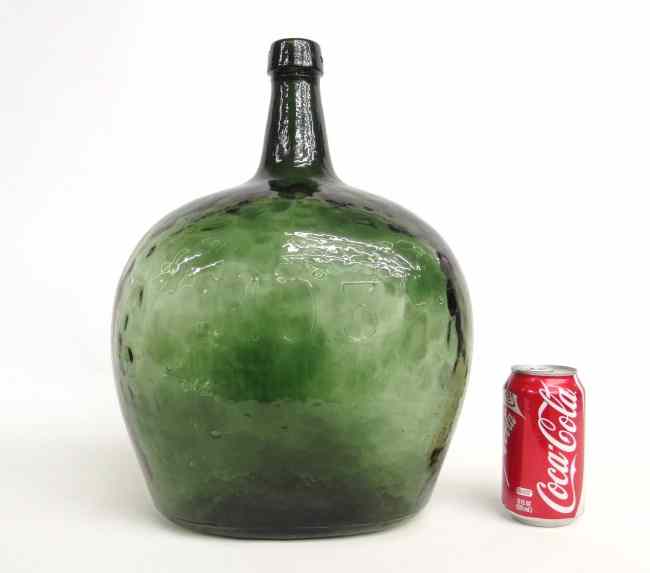 Appraisal: C - European demi john wine bottle Embossed '' ''