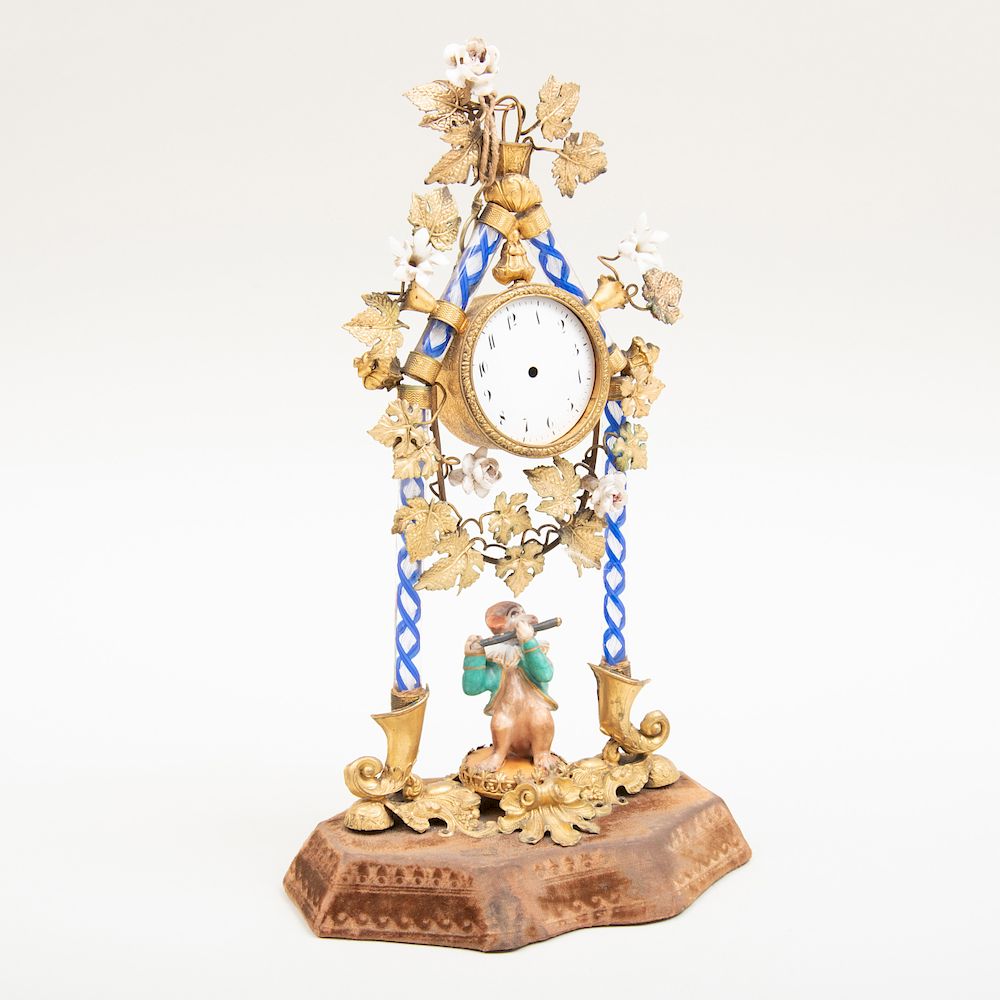 Appraisal: Continental Ormolu-Mounted Porcelain and Caned Glass Clock Continental Ormolu-Mounted Porcelain