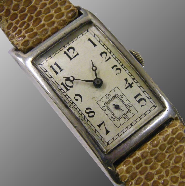 Appraisal: Omega 's silver rectangular gentleman's wristwatch the silvered dial with