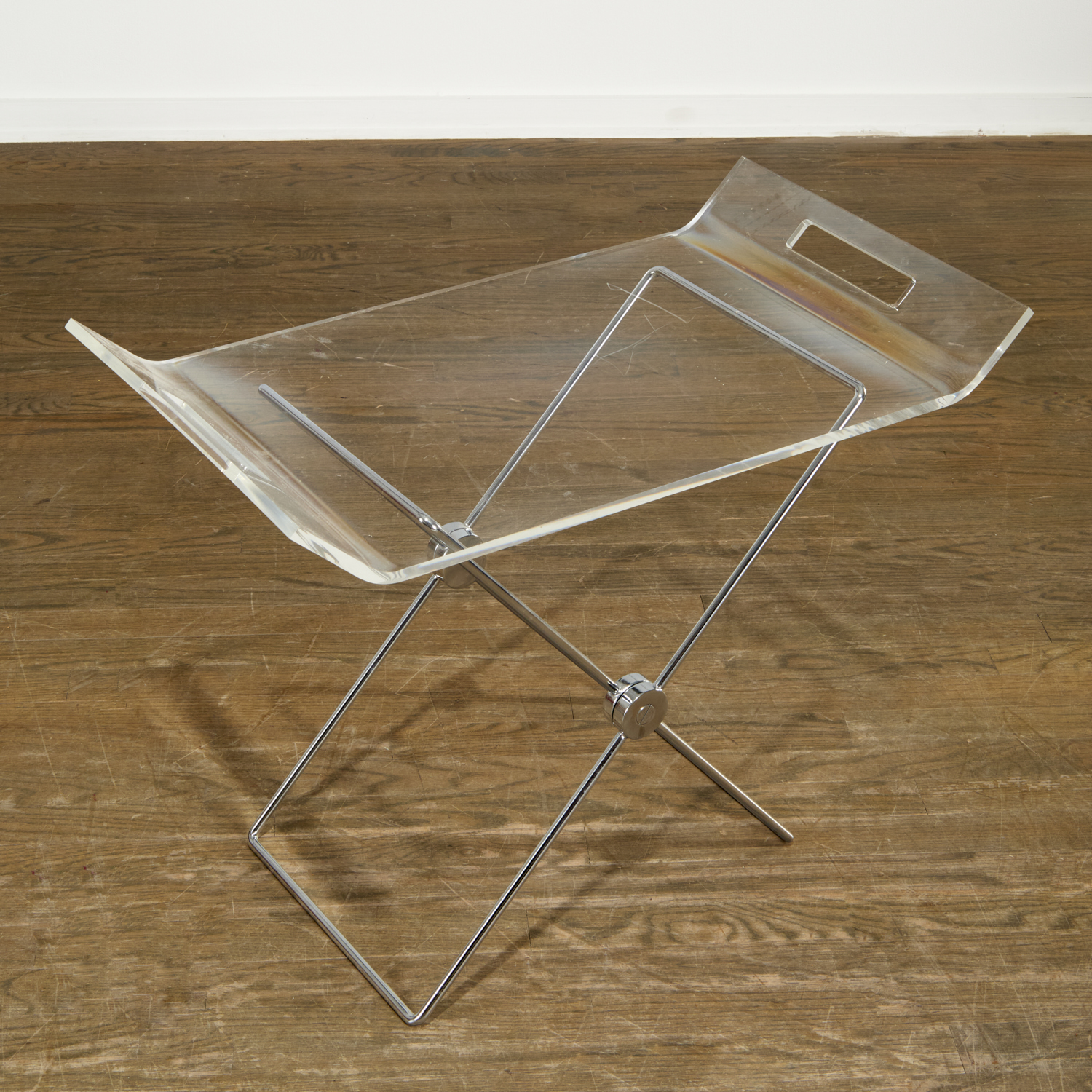 Appraisal: CHARLES HOLLIS JONES ACRYLIC AND CHROME TRAY TABLE c American