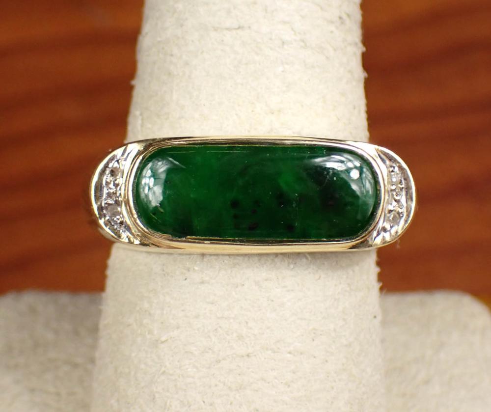 Appraisal: MAN'S JADE DIAMOND AND FOURTEEN KARAT GOLD RING The yellow