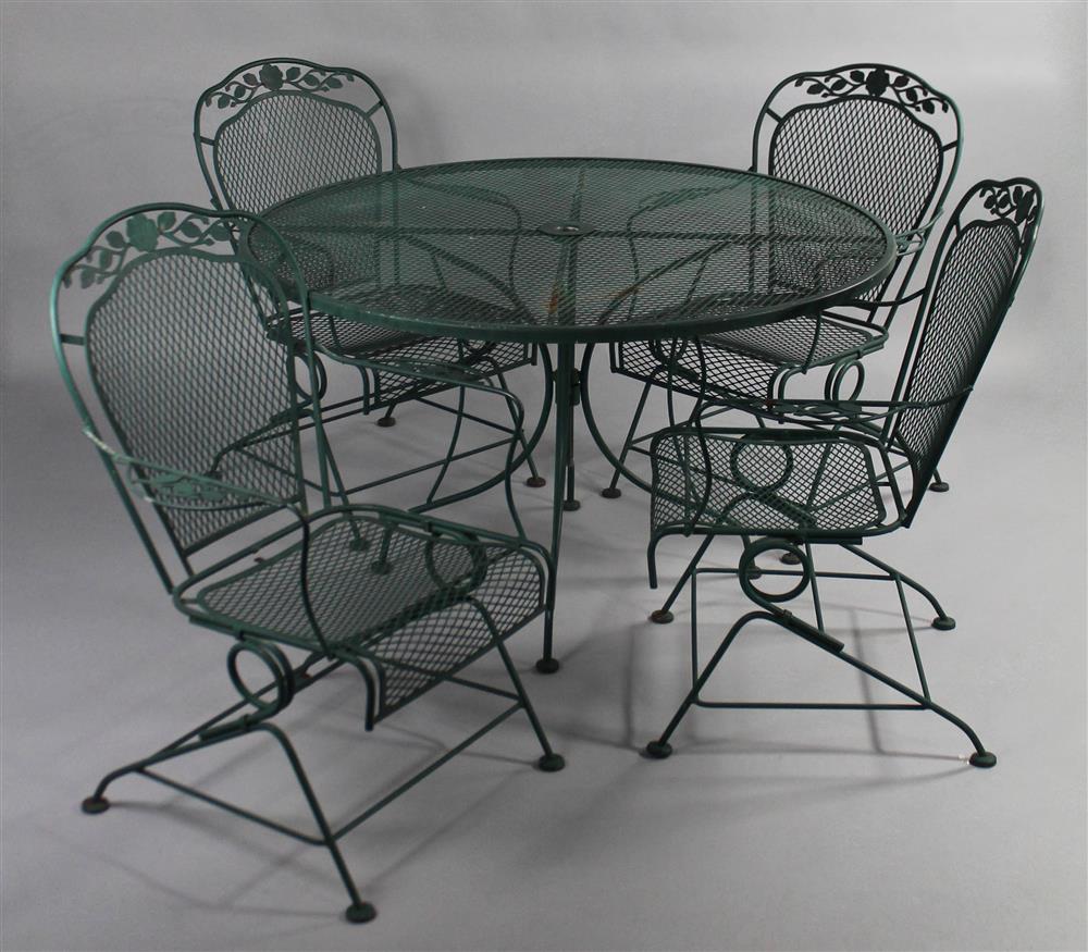 Appraisal: GARDEN CAST METAL CIRCULAR TABLE AND FOUR CHAIRS SET green