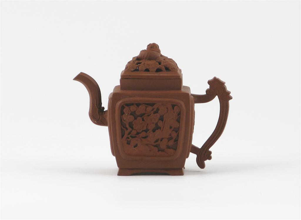 Appraisal: A Chinese Yixing brown stoneware teapot and cover