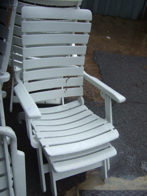 Appraisal: A set of four white folding garden chairs with loose