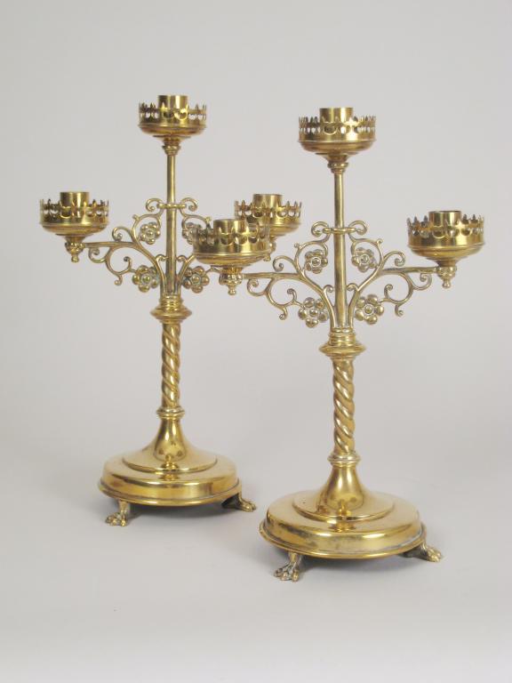 Appraisal: Pair of brass three light gothic style Candle Holders with