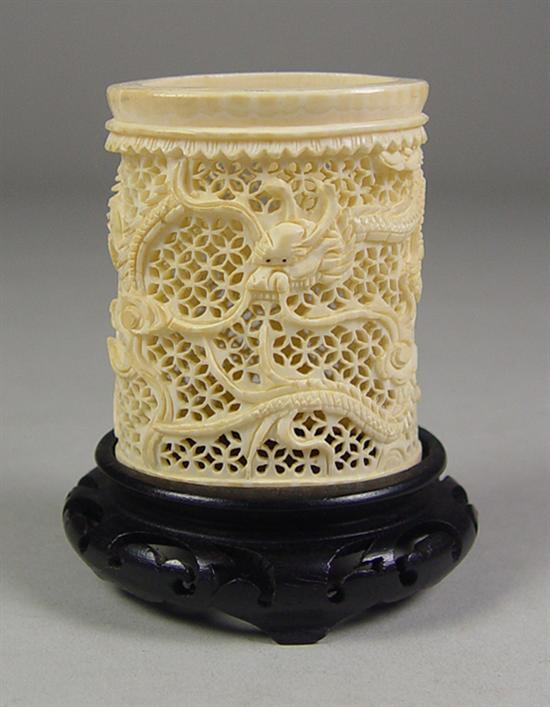 Appraisal: Carved Pierced Ivory Cylinder on Stand Circa Nicely carved figures