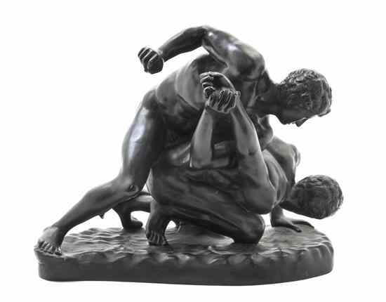 Appraisal: A Neoclassical Bronze Figural Group after the Antique depicting two