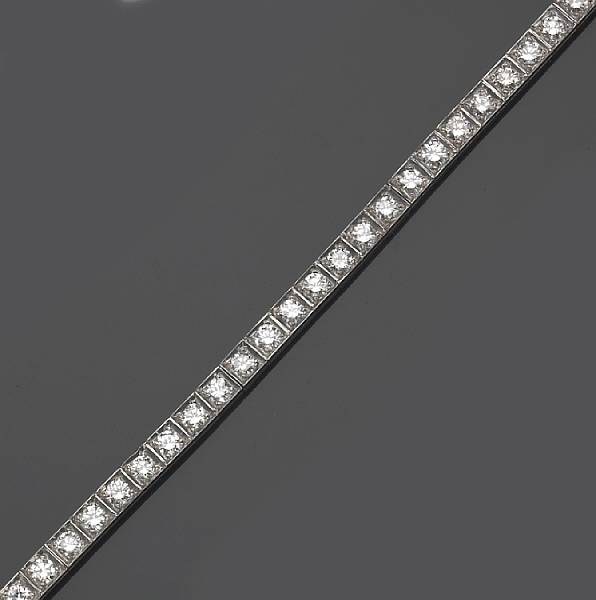 Appraisal: A diamond and platinum line bracelet estimated total diamond weight