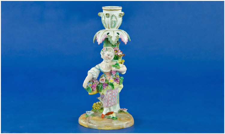 Appraisal: German Porcelain Candlestick Surmounted With A Figure Of A Flower