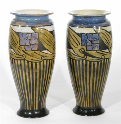 Appraisal: A pair of Royal Doulton stoneware vases by Maud Bowden